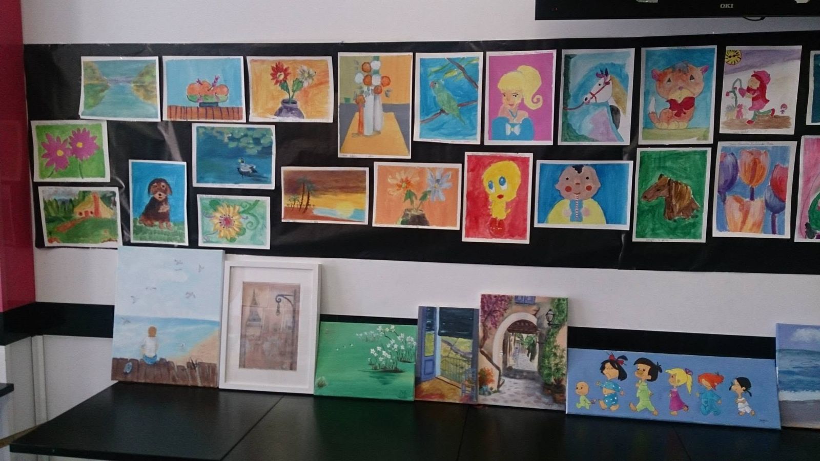 Pared de retratos y paisajes de alumnos, exposición 2014